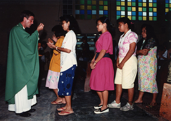 Fr. Edward Shellito with a congregation in the Philippines