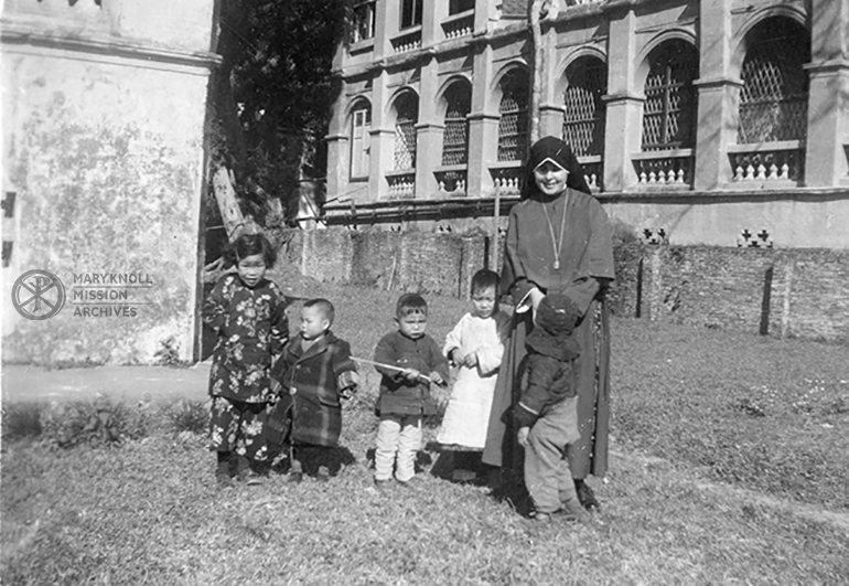 Sr. Rose Bernadette with local children in Wuchow