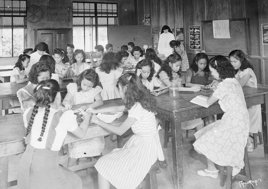 Sister Anne Vincent Hirsch and Sister Maria Concepcion Kalaw teaching a science class in Lucena, 1947