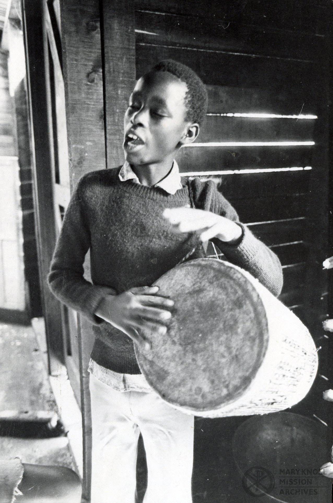 Boy with drum, Kenya