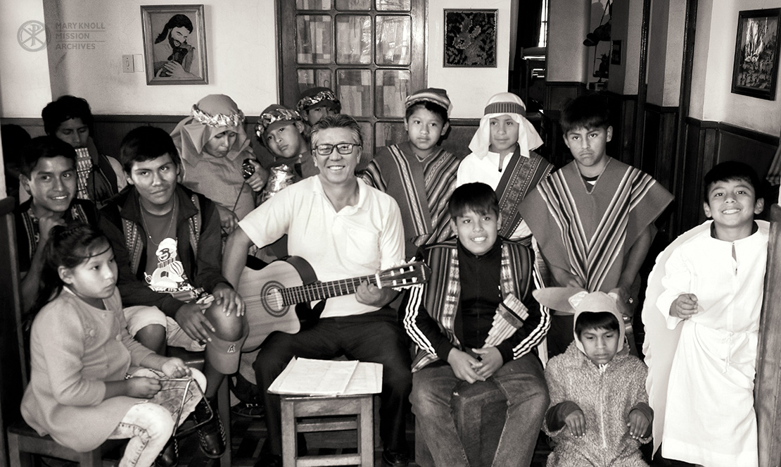 Former Lay Missioner Sonny Nguyen with the children at Casa Nazaret
