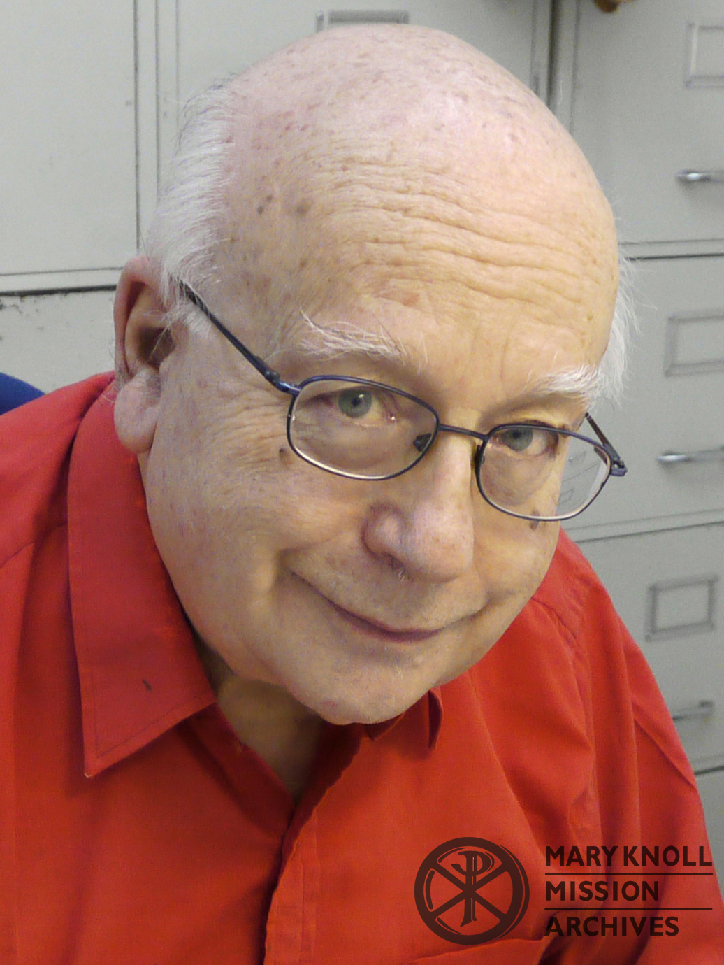 Brother Sebastian MM, drawing cartoons at the Maryknoll Center House, photo by Sean Sprague