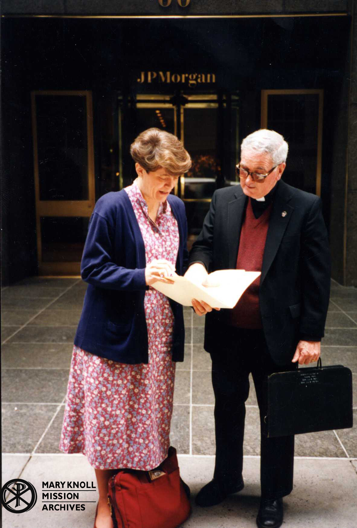Father La Mar in front of J. P. Morgan offices in New York City