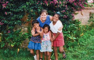 Maryknoll Affiliate Erin Rickwa at an orphanage in Bolivia, 1995