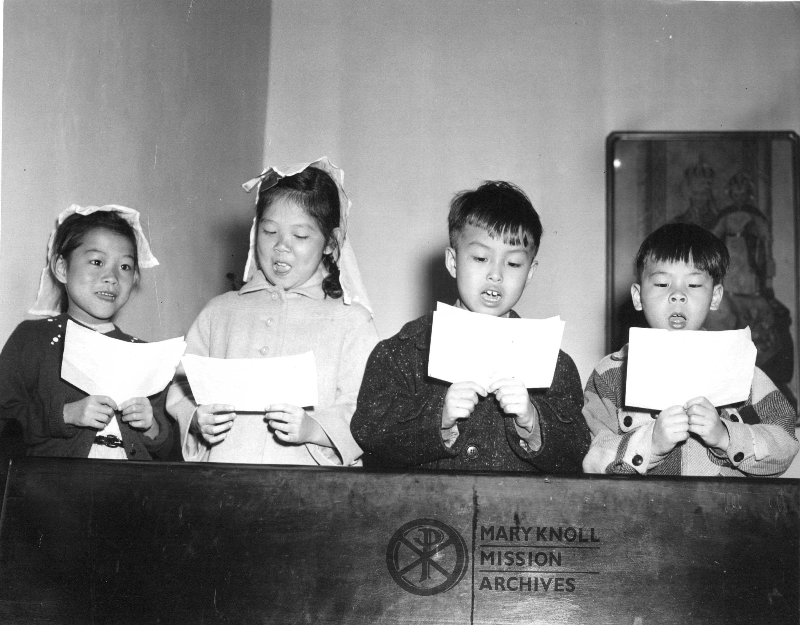 St Therese School_Children Singing_watermark Children singing at St. Therese School