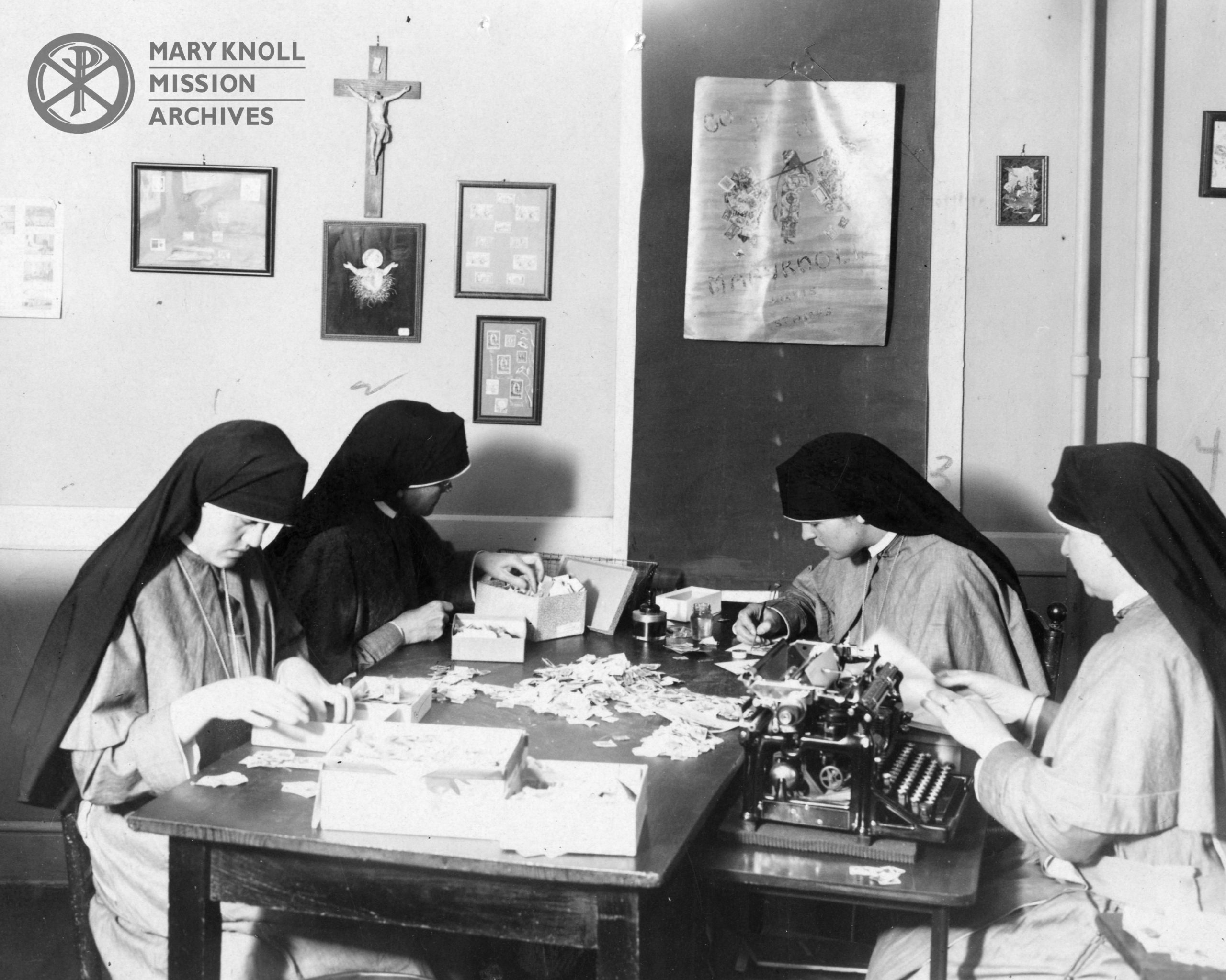 stampdept_8x10_watermark Maryknoll Sisters sorting used stamps, which will later be featured in greeting card art.