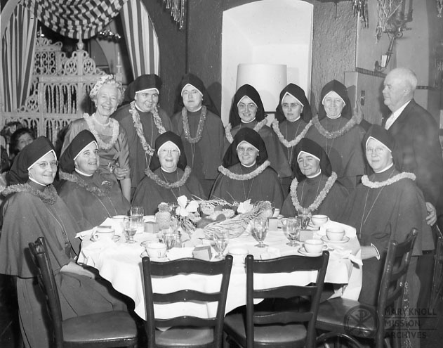 SrMargaretJamesReception_GroupPhoto_1959 Group photo of Maryknoll Sisters and Mr. & Mrs. Roe at the Reception and Luncheon for Sr. Margaret James on December 8, 1959.