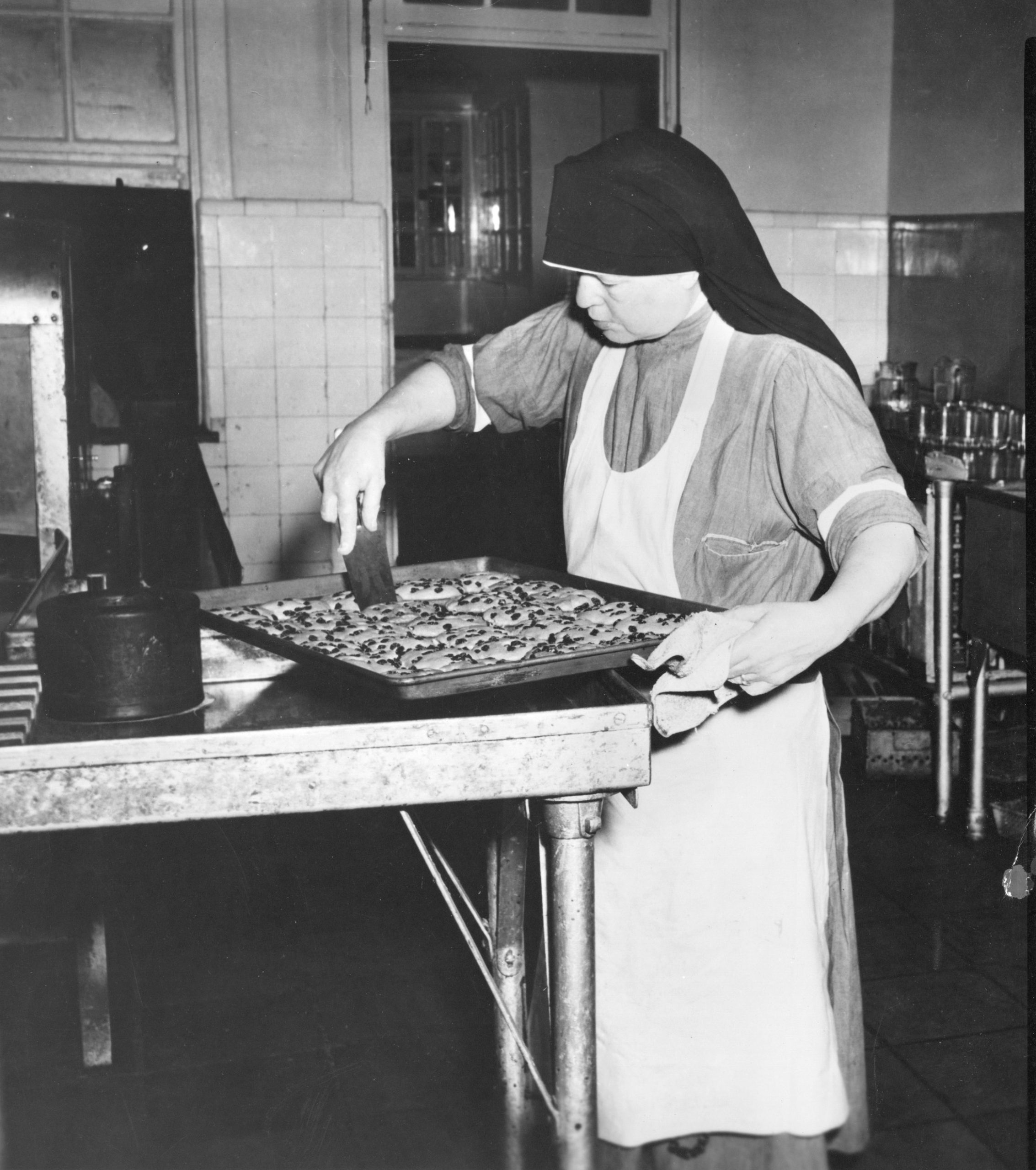 Sr. Fabian O'Handley making cookies in the Seminary Kitchen
